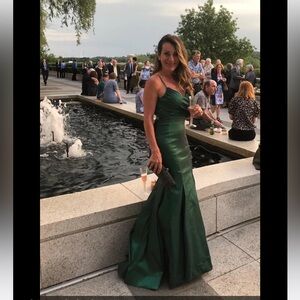 Beautiful  green gown wore only one time , size 6. Looks like brand new .